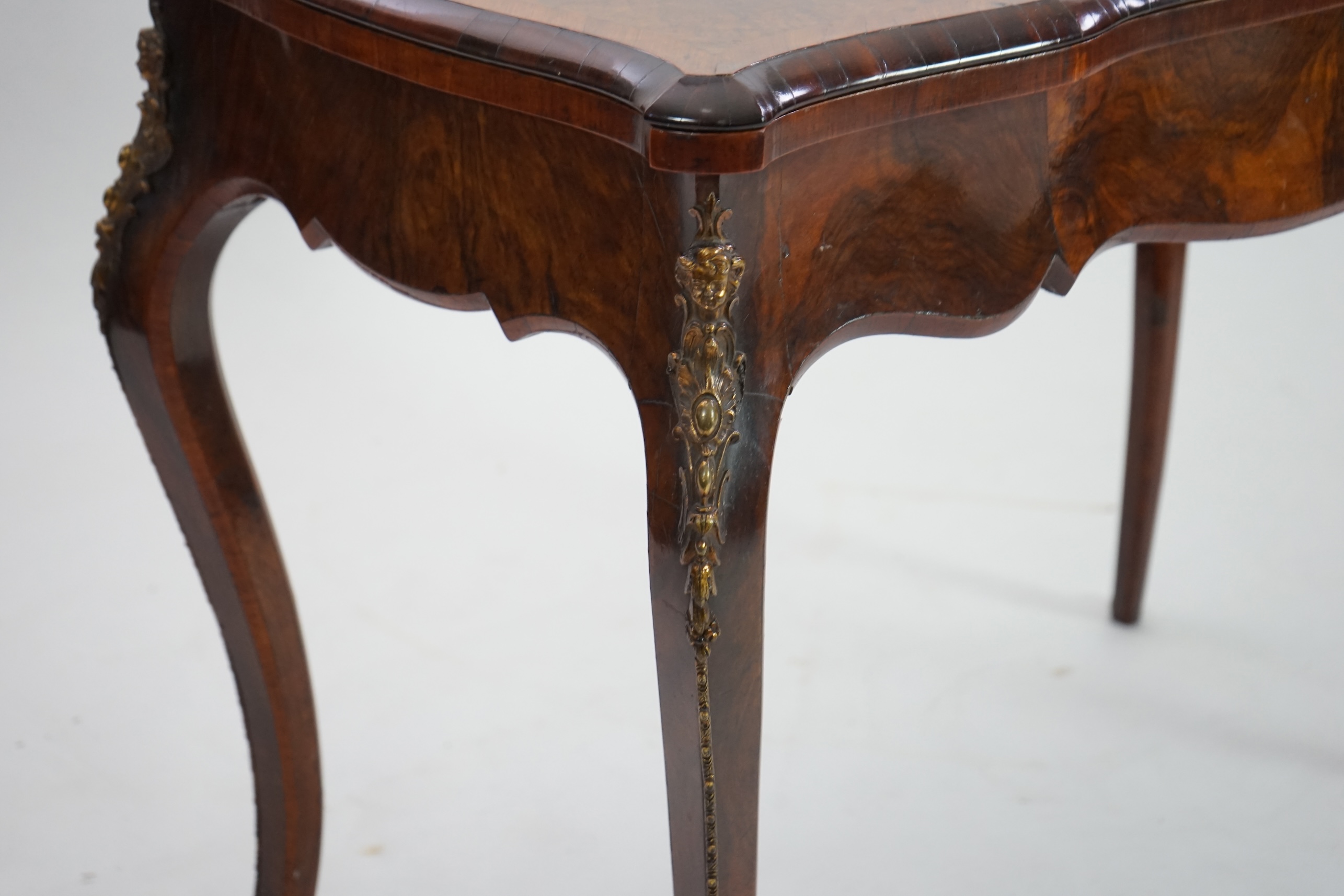 A Victorian marquetry inlaid burr walnut card table